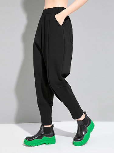 Élasticité lâche simple et cool pantalon harem décontracté.