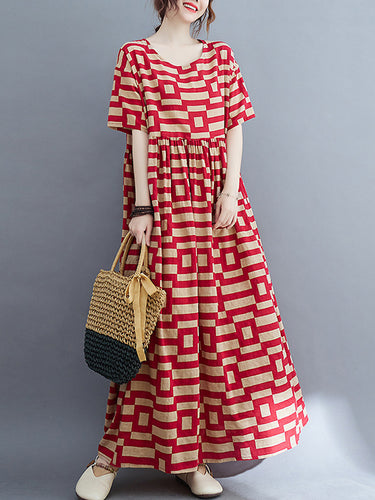ゆるい半袖の格子縞のラウンドネックミディドレス