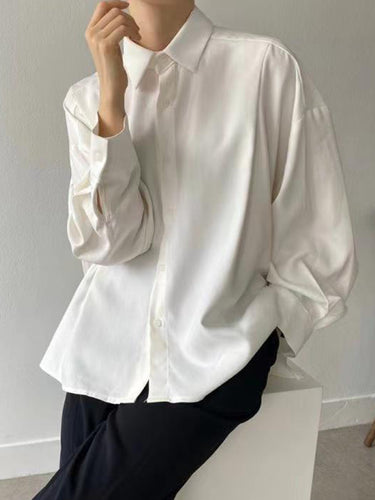 シンプルな長袖のゆるいボタン付きプリーツ固形色のラペルカラーブラウスシャツのトップス