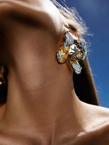 Accesorios de aretes geométricos de forma de flores
