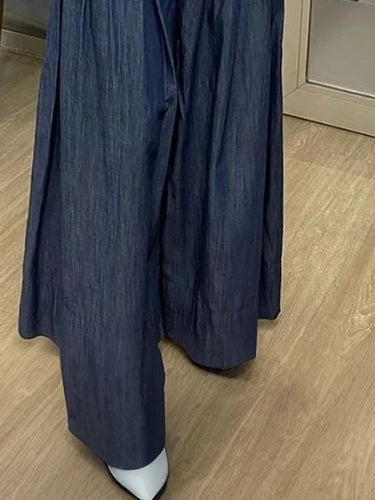 Tasche a pieghe con abbottonate con abbottonate con abbottonate con pantaloni di colore solido