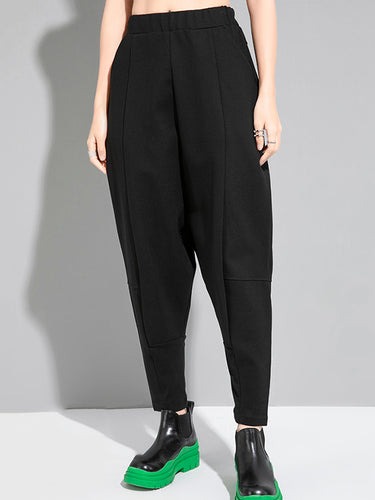 Élasticité lâche simple et cool pantalon harem décontracté.