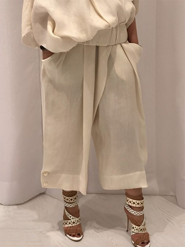 Lose breite Beinknopf mit fester Farbe Casual Hosenboden Hose