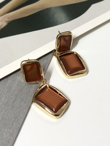 Accesorios de aretes geométricos