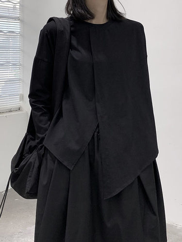 長袖のゆるい非対称のソリッドカラースプリットフロントスプリットジョイントラウンドネックTシャツ