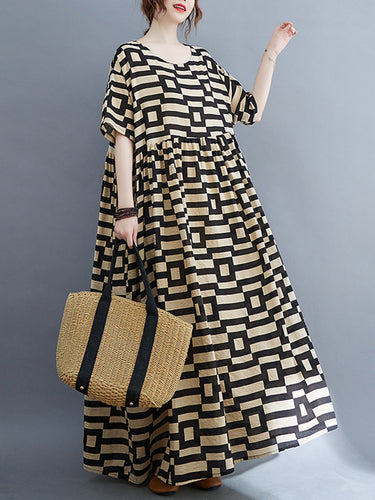 ゆるい半袖の格子縞のラウンドネックミディドレス