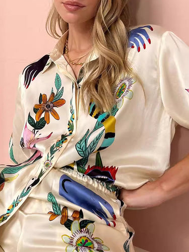 ハーフスリーブルーズボタン付きフラワープリントポケットラペルTシャツトップ +ドローストリング弾力性パンツボトム2ピースセット