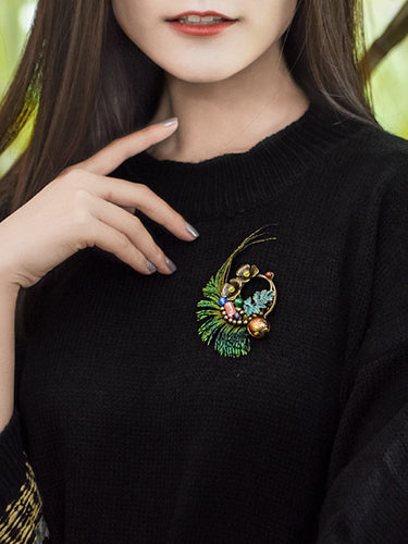 عتيقة بروش الأزهار ريشة الطاووس