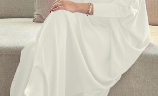 How to Wear Gold Heels With a White Dress