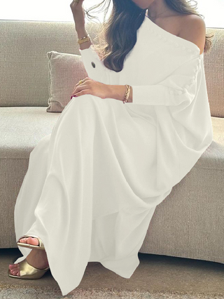 How to Wear Gold Heels With a White Dress