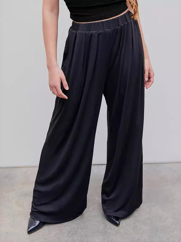 Pantaloni a sud-estici di elasticità a dimensioni più sciolte pantaloni
