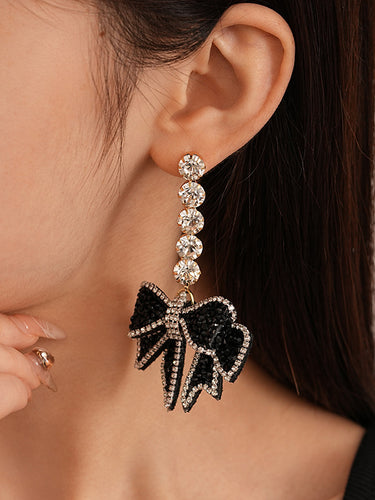 Accesorios de aretes brillantes de Bowknot con cuentas