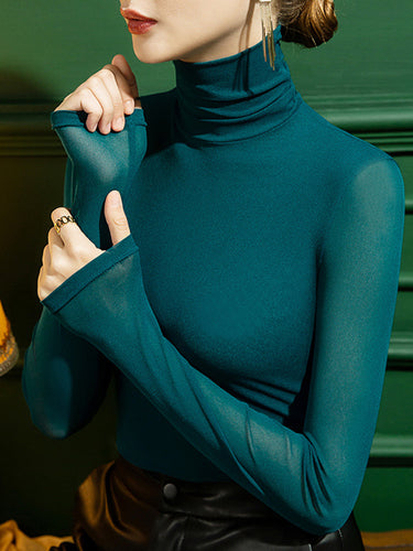 الأكمام الطويلة بالإضافة إلى حجم القمصان ذات اللون الصلب المقسوم