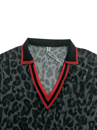 Camicette ampie a maniche corte con stampa leopardata a contrasto e revers a righe con spacco laterale.&Stop