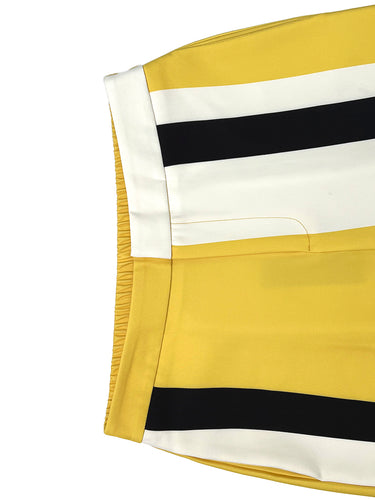Pantalones a rayas con bolsillos de color en contraste de talle alto