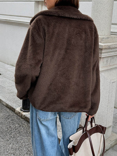 1731528 Langärmlige, locker sitzende Jacke mit geknöpften Taschen, einfarbig, mit geteiltem Revers 