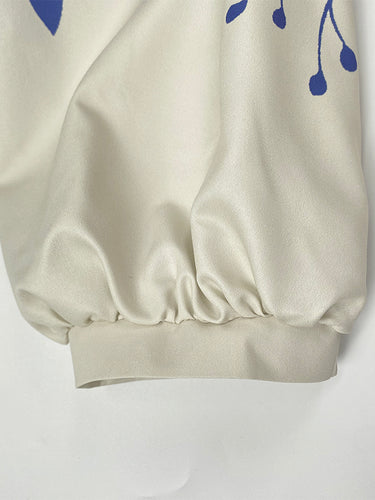 Demi-manches à bouton haut-bas Fleur Imprimé palissée Brousses Shirts Tops