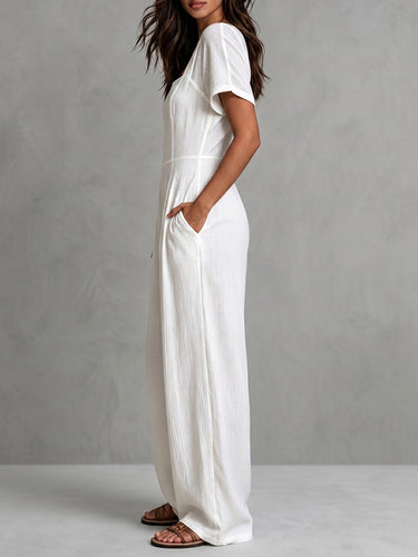 1774029 Hoog getailleerde korte mouwen, rugloze geplooide zakken, effen kleur ritssluiting, jumpsuits met vierkante hals