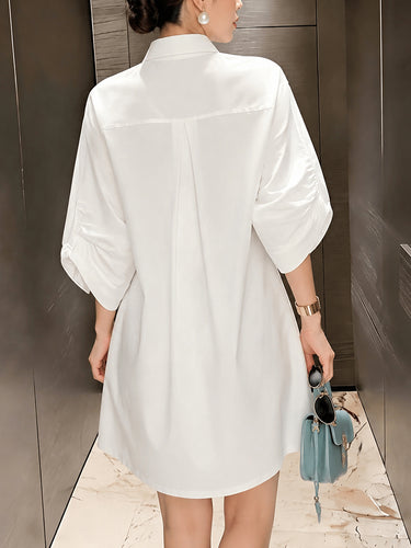 1782998 Loose Puff Sleeves Buttoned Pleated Pockets Solid Color Lapel Mini Dresses