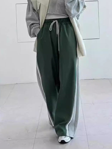ハイウエストのゆるいドローストリングの弾力性スプリットジョイントパンツのズボン