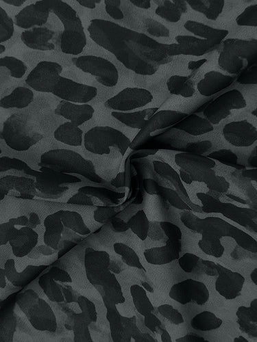 Camicette ampie a maniche corte con stampa leopardata a contrasto e revers a righe con spacco laterale.&Stop