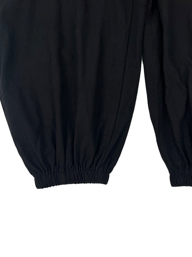 Combinaisons sans manches à jambes larges et poches boutonnées de couleur unie à col en V