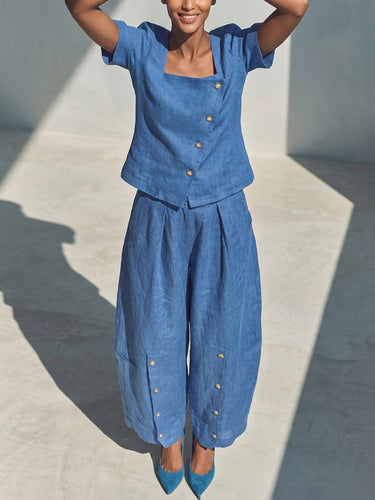 1767802 Pantalon ample à jambes larges et poches boutonnées, couleur unie