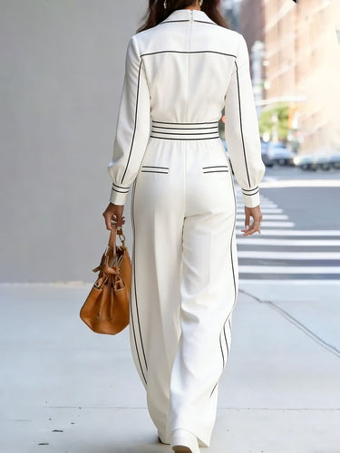 Jumpsuits met hoge taille, lange mouwen en contrasterende kleuren, geplooide zakken en ingekerfde kraag