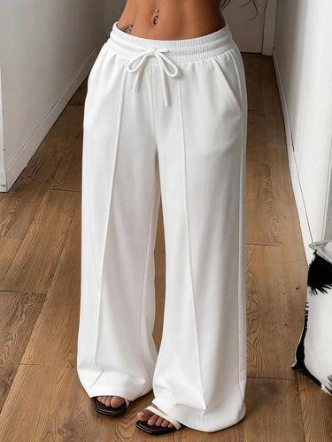 1788541 Solid Color Pockets Elasticity Drawstring Wide Leg Loose Trousers Pants