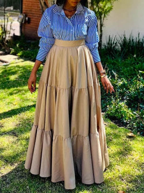 Gestreepte blouse en geplooide rok als gecoördineerde Broadway-look