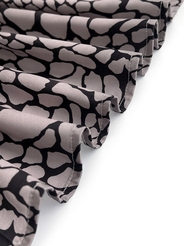 Maniche lunghe a base di contrasto abbottonato a contrasto con le camicette con camicette con legno stampato in pelle di serpente