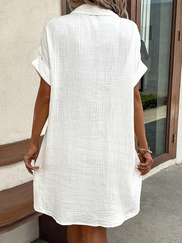 1768161 Half Sleeves Loose Buttoned Pockets Solid Color Lapel Mini Dresses