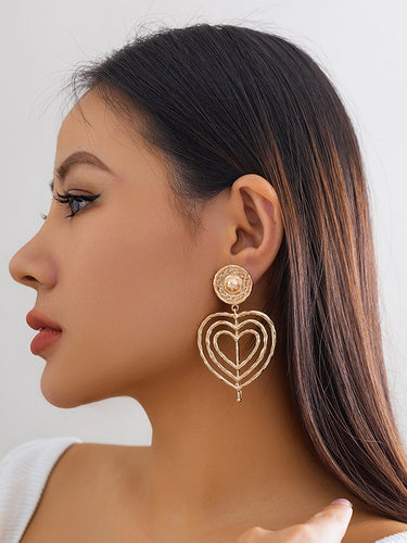 Normcore Geometrische Herzform hohle Festfarb Ohrringe