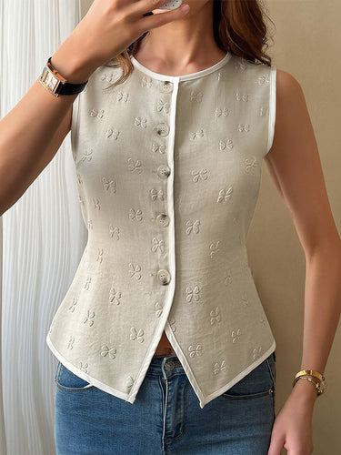 1772966 Mouwloze jacquardvesttop met ronde hals en knopen