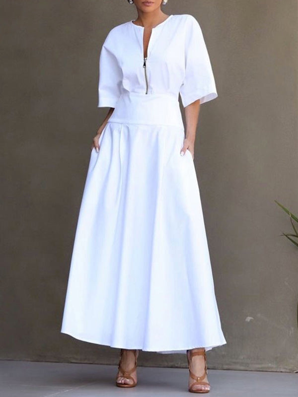 Witte maxi-jurk met rits en neutrale schoenen