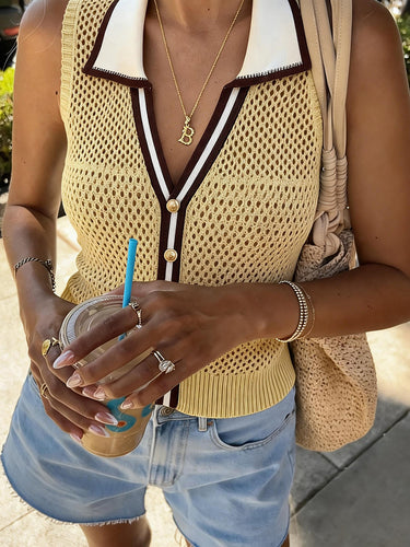 1787124 Loose Sleeveless Buttoned Contrast Color Lapel Vest Top