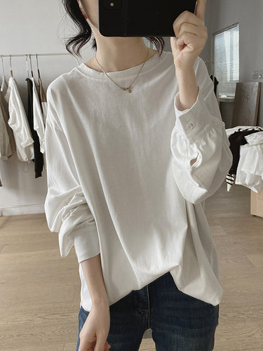 長袖ソリッドカラーの丸いネックTシャツのトップス