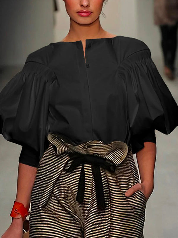 Zwarte blouse met pofmouwen