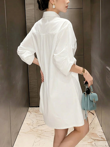 1782999 Loose Puff Sleeves Buttoned Pleated Pockets Solid Color Lapel Mini Dresses