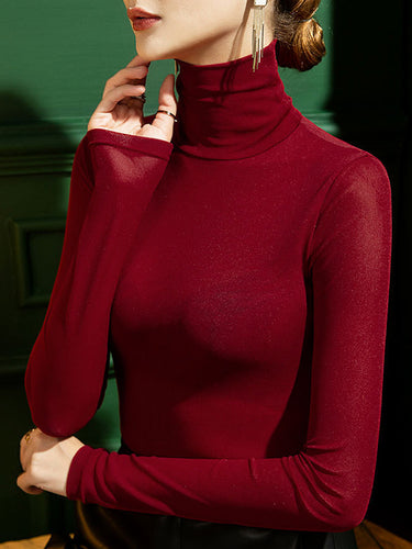 الأكمام الطويلة بالإضافة إلى حجم القمصان ذات اللون الصلب المقسوم